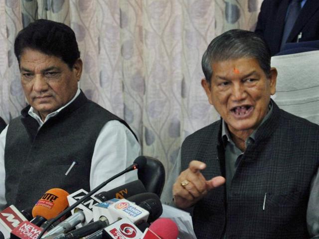 Uttarakhand chief minister Harish Rawat with Health Minister Surendra Singh Negi addresses a press conference in Dehradun. (PTI File Photo) Uttarakhand chief minister Harish Rawat with Health Minister Surendra Singh Negi addresses a press conference in Dehradun. (PTI File Photo)