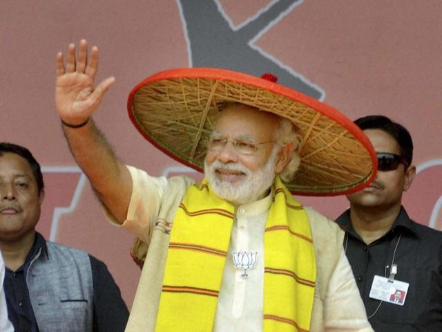Prime Minister Narendra Modi addresses an election rally in Assam. (PTI) Prime Minister Narendra Modi addresses an election rally in Assam. (PTI)