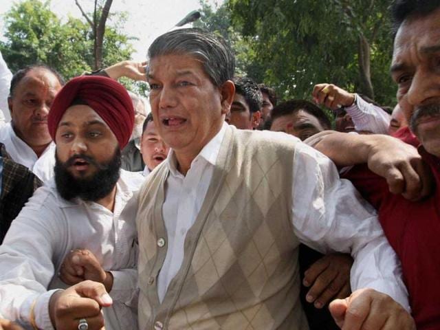 Congress rebel legislators on Saturday released a sting video of chief minister Harish Rawat which, they alleged, showed him indulging in horse-trading to save his government.(PTI File Photo) Congress rebel legislators on Saturday released a sting video of chief minister Harish Rawat which, they alleged, showed him indulging in horse-trading to save his government.(PTI File Photo)