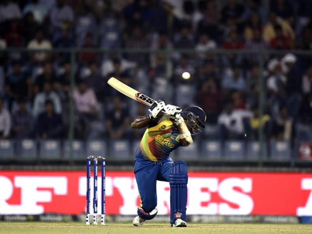 Angelo Mathews ducks to avoid getting hit by a bouncer. (Sanjeev Verma/HT Photo) 