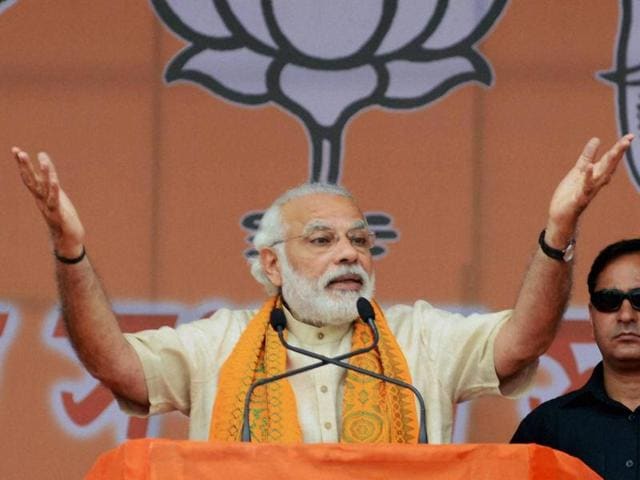Prime Minister Narendra Modi addressing an election rally in Sonitpur district of Assam on Sunday. (PTI Photo) Prime Minister Narendra Modi addressing an election rally in Sonitpur district of Assam on Sunday. (PTI Photo)