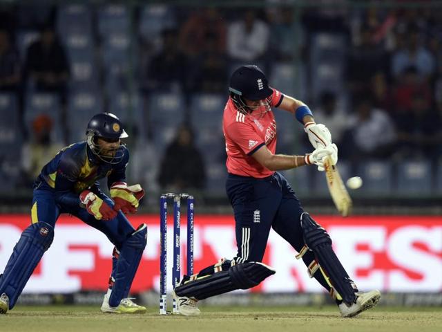 Jason Roy hits a shot as Dinesh Chandimal watches. (Sanjeev Verma/HT Photo) 