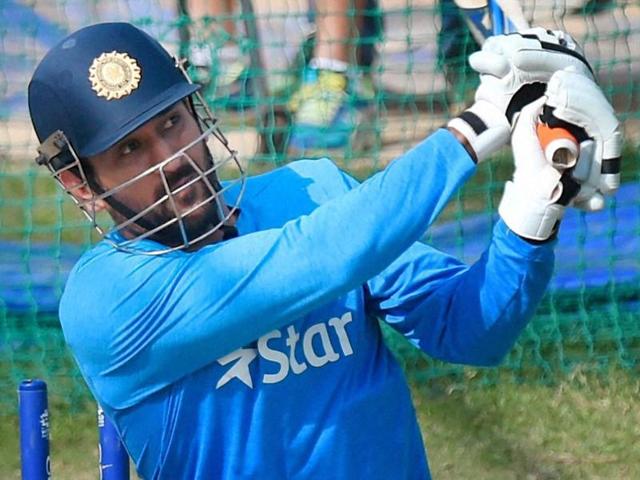 MS Dhoni bats in the nets during a training session n Mohali. (PTI Photo) MS Dhoni bats in the nets during a training session n Mohali. (PTI Photo)