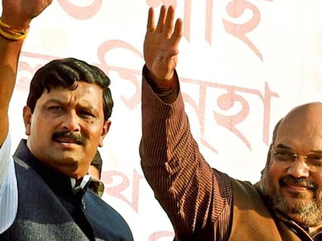 BJP president Amit Shah with Bengal chief Rahul Sinha at a rally in Burdwan district. (PTI Photo) BJP president Amit Shah with Bengal chief Rahul Sinha at a rally in Burdwan district. (PTI Photo)