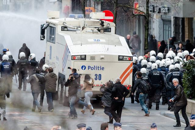 Police use a water canon as right wing demonstrators protest at a memorial site at the Place de la Bourse in Brussels. (AP Photo) Police use a water canon as right wing demonstrators protest at a memorial site at the Place de la Bourse in Brussels. (AP Photo)