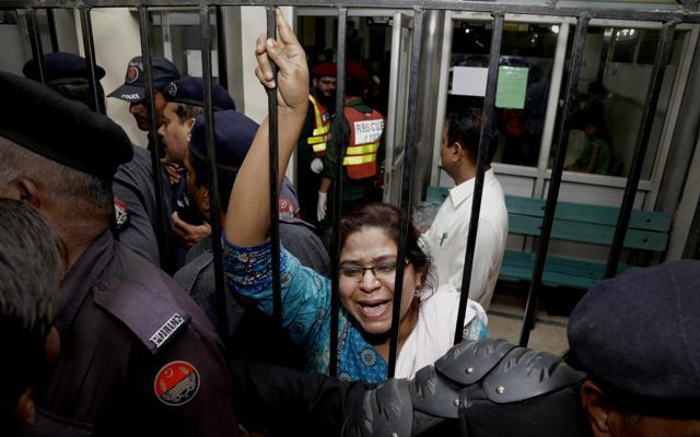 A woman weeps for her injured family members as she tries to speak to security at a local hospital in Lahore. (AP Photo) A woman weeps for her injured family members as she tries to speak to security at a local hospital in Lahore. (AP Photo)