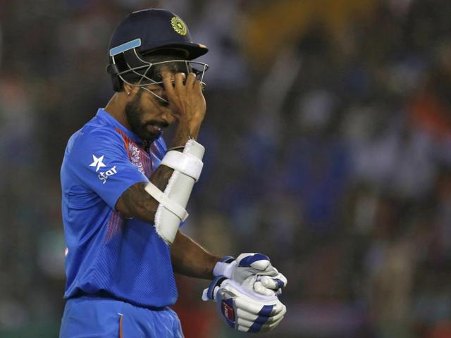 Shikhar Dhawan walks off the field after his dismissal. (REUTERS) 