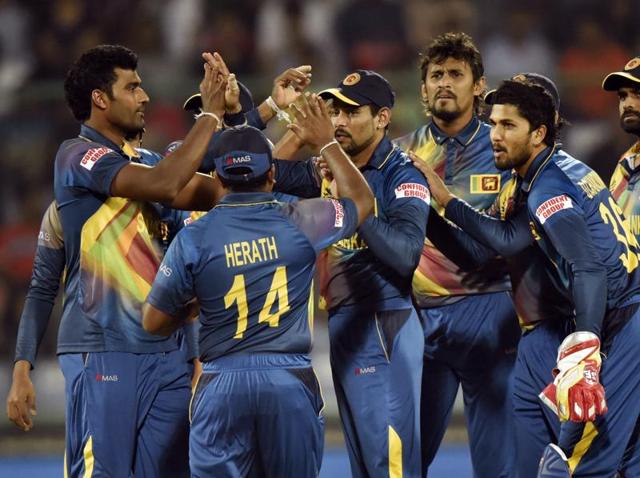 Sri Lankan team members celebrate the wicket of South African batsman Quinton De Kock. (Mohd Zakir/HT Photo) 