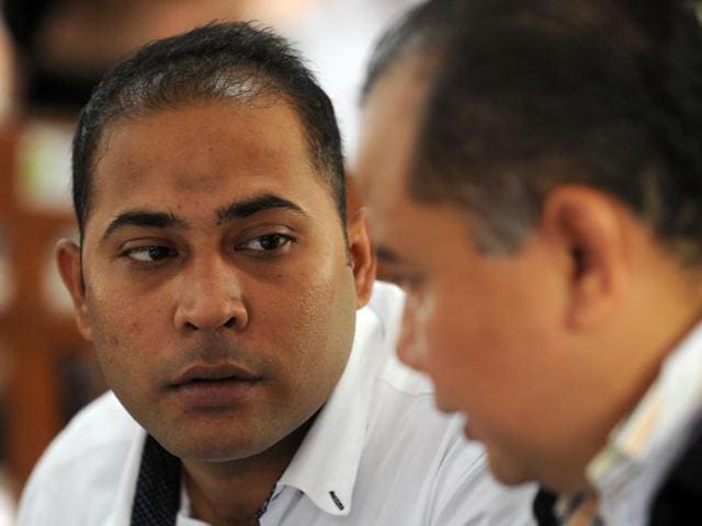 Sayed Mohammed Said speaks with his lawyer in the courtroom before the start of proceedings he attends his sentencing on drugs related charges in Denpasar on Indonesia's resort island of Bali. (AFP) Sayed Mohammed Said speaks with his lawyer in the courtroom before the start of proceedings he attends his sentencing on drugs related charges in Denpasar on Indonesia's resort island of Bali. (AFP)