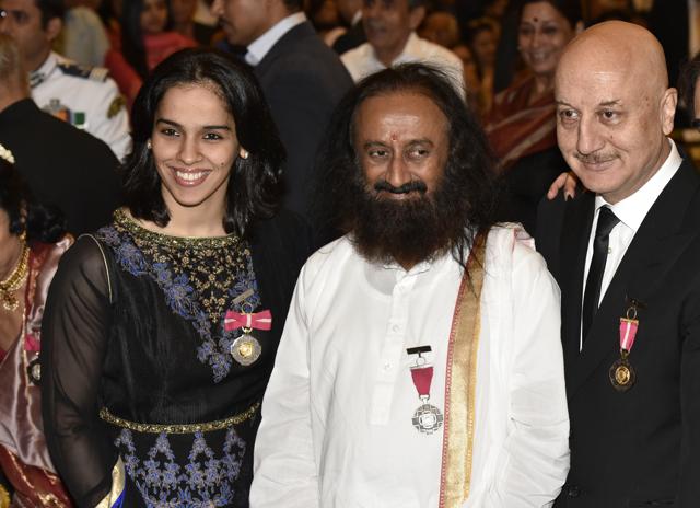 Padma awardees Saina Nehwal, Sri Sri Ravi Shankar and Anupan Kher during the ceremony. (Virendra Singh Gosain/HT Photo)