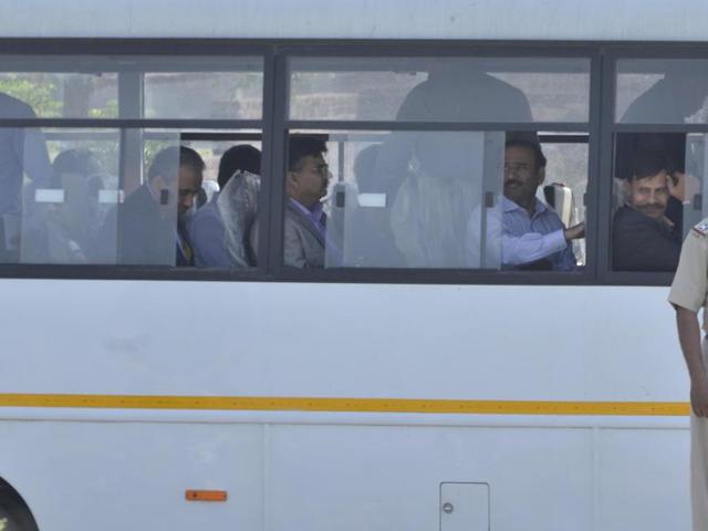 Members of the investigation team coming out from Air Force Base in Pathankot on Tuesday. (Sameer Sehgal / HT )