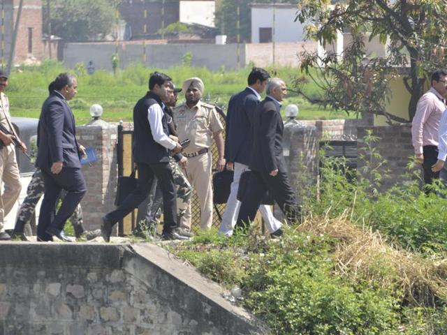 Members of a Pakistani Joint Investigation Team cross a bridge after leaving an Indian Air Force base in Pathankot on Tuesday. (Sameer Sehgal/HT Photo) Members of a Pakistani Joint Investigation Team cross a bridge after leaving an Indian Air Force base in Pathankot on Tuesday. (Sameer Sehgal/HT Photo)