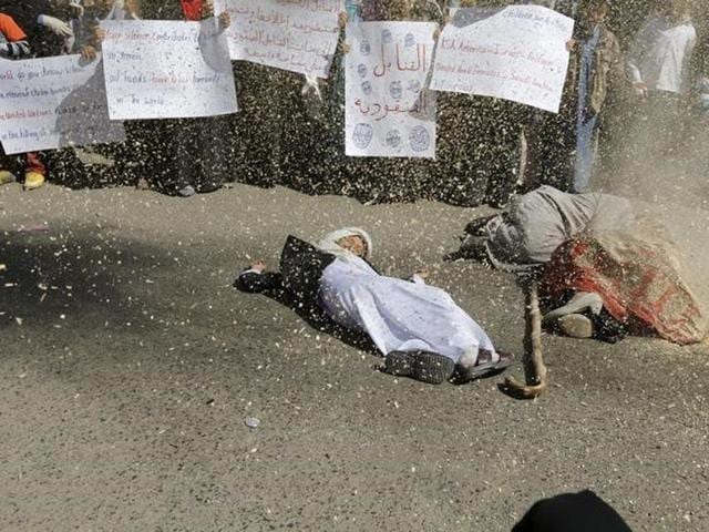 Children lie on the ground as they act as victims of air strikes during a protest outside the United Nations offices against Saudi-led air strikes, in Yemen's capital Sanaa. REUTERS Children lie on the ground as they act as victims of air strikes during a protest outside the United Nations offices against Saudi-led air strikes, in Yemen's capital Sanaa. REUTERS