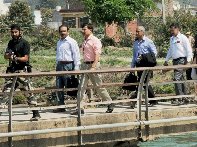 A five-member Pakistani investigation team reached the Pathankot air base on Tuesday amid vociferous protests by activists of the Congress, AAP and Shiv Sena. (PTI Photo) A five-member Pakistani investigation team reached the Pathankot air base on Tuesday amid vociferous protests by activists of the Congress, AAP and Shiv Sena. (PTI Photo)