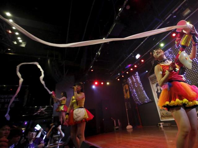 The Tokyo-based all female band has 18 members, split into three groups that perform across Japan and elsewhere in Asia. (REUTERS) 