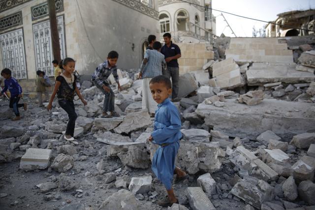 Children play amid the rubble of a house destroyed by a Saudi-led airstrike in Sanaa, Yemen. (AP) Children play amid the rubble of a house destroyed by a Saudi-led airstrike in Sanaa, Yemen. (AP)