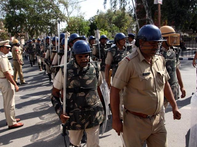 Even as Haryana assembly passed the reservation bill, security in Rohtak remained tight with the police conducting a flag march on Delhi Road. (Manoj Dhaka/ HT Photo) Even as Haryana assembly passed the reservation bill, security in Rohtak remained tight with the police conducting a flag march on Delhi Road. (Manoj Dhaka/ HT Photo)