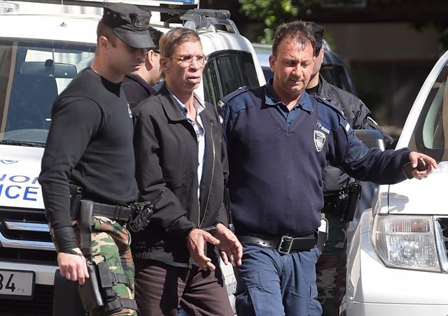 Seif al-Din Mohamed Mostafa, an Egyptian man who hijacked an EgyptAir passenger plane the previous day and forced it to divert to Cyprus demanding to see his ex-wife, wears handcuffs as he leaves the court in Larnaca escorted by Cypriot police. (AFP Photo) Seif al-Din Mohamed Mostafa, an Egyptian man who hijacked an EgyptAir passenger plane the previous day and forced it to divert to Cyprus demanding to see his ex-wife, wears handcuffs as he leaves the court in Larnaca escorted by Cypriot police. (AFP Photo)