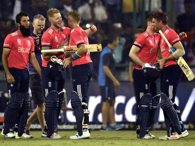 Jos Buttler and Joe Root of England congratulated by teammates after England beat New Zealand in the ICC World T20 semifinal at the Feroz Shah Kotla Stadium in New Delhi on March 30, 2016. (Virendra Singh Gosain/HT Photo) 