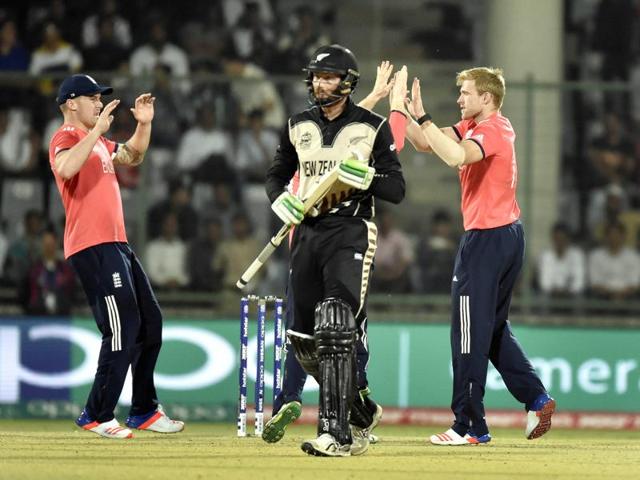 David Willey celebrates the dismissal of New Zealand player Martin Guptill. (Ajay Aggarwal/HT Photo) 