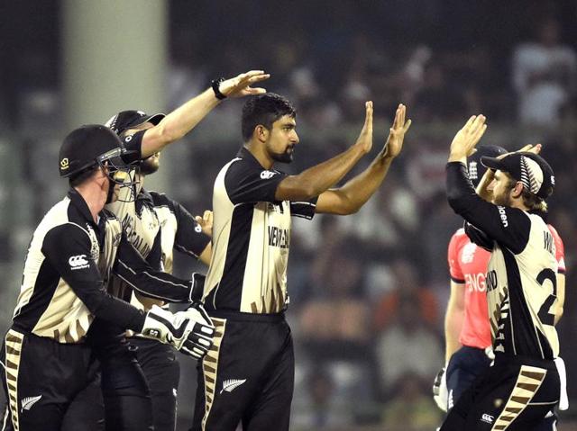Ish Sodhi is congratulated by team members after dismissal of England player Eoin Morgan. (Ajay Aggarwal/HT Photo) 