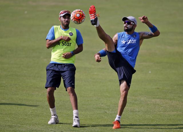 India's Virat Kohli, right, and Bhuvaneshwar Kumar play with a football during a practice session ahead. (AP) India's Virat Kohli, right, and Bhuvaneshwar Kumar play with a football during a practice session ahead. (AP)
