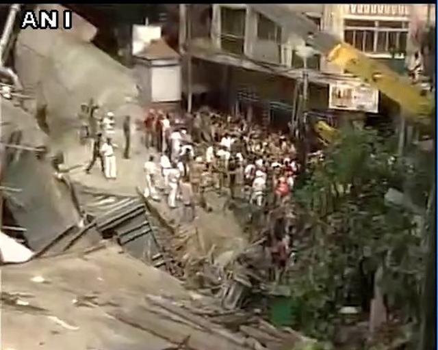 Visuals of the collapsed under-construction bridge near Ganesh Talkies in Kolkata (ANI) Visuals of the collapsed under-construction bridge near Ganesh Talkies in Kolkata (ANI)