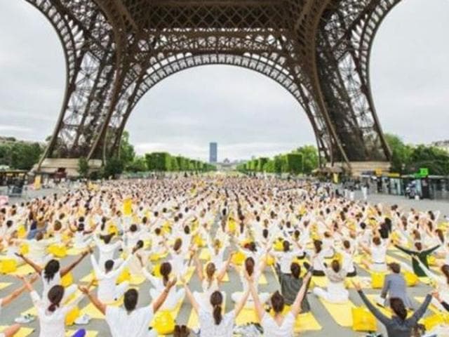 Over the years, it has become the stage for numerous events of global significance. In this image, thousands of yoga enthusiasts participate in a session at the foot of the Eiffel Tower as part of an international tour.  (Instagram) 