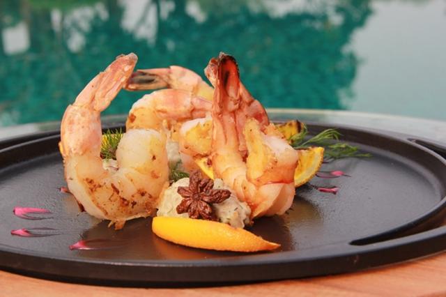 Grilled prawns with herb barley, and saffron cream sauce at Novotel Imagica Khopoli