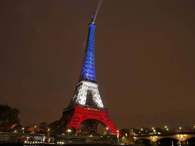 The historic monument lit up in the colours of the French national flag post the terror attacks in Paris on November 13, 2015 that killed 130 people and injured another 368. (AP) 