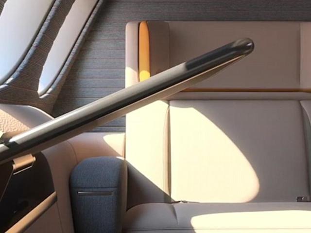 Each suite would have soft furnishings, storage for hand luggage and a large table that can be stowed. (seymourpowell.com)