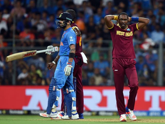 Dwayne Bravo miss the run out of Indian player Virat Kohli. (Kunal Patil/HT Photo) Dwayne Bravo miss the run out of Indian player Virat Kohli. (Kunal Patil/HT Photo)