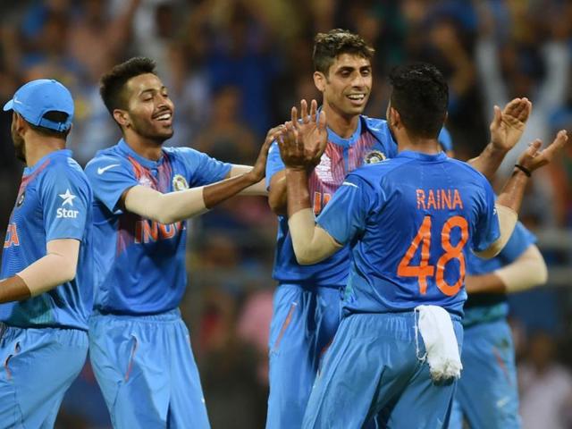 India's Ashish Nehra with his team mates celebrates the wicket of West Indies Marlon Samuels. (Kunal Patil/HT Photo) India's Ashish Nehra with his team mates celebrates the wicket of West Indies Marlon Samuels. (Kunal Patil/HT Photo)
