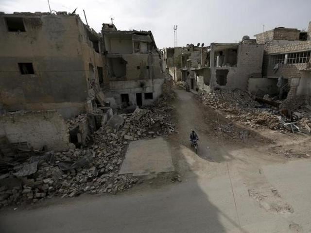 A drone strike near the Islamic State group’s de facto Syrian capital Raqa killed a jihadist commander. (Reuters File Photo) A drone strike near the Islamic State group’s de facto Syrian capital Raqa killed a jihadist commander. (Reuters File Photo)