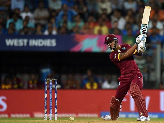 West Indies batsman Lendl Simmons plays a shot during the World T20 cricket tournament semi-final match between India and West Indies at The Wankhede Cricket Stadium in Mumbai on March 31, 2016.(AFP)