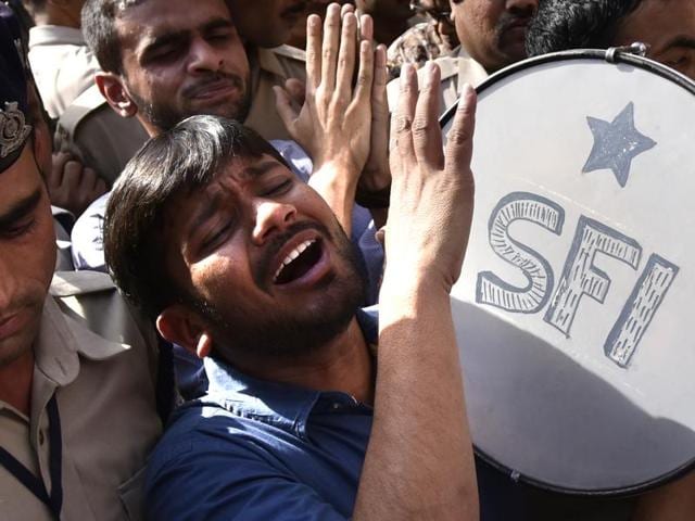 JNU students Kanhaiya Kumar with Umar Khalid and other students of JNU and others during the peace march for Rohit Vermula Justice on Wednesday.(Arun Sharma/HT Photo)
