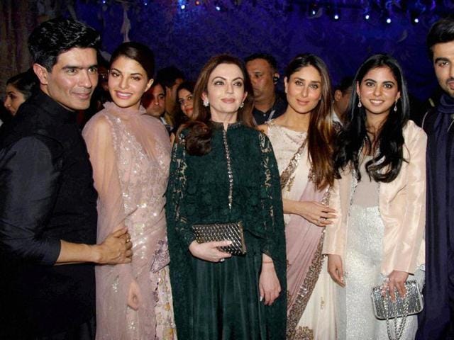 Fashion designer Manish Malhotra with actors Arjun Kapoor, Kareena Kapoor and Jacqueline Fernandez, Nita Ambani and her daughter Isha Ambani during the opening show of Lakme Fashion Week in Mumbai on Tuesday. (PTI) Fashion designer Manish Malhotra with actors Arjun Kapoor, Kareena Kapoor and Jacqueline Fernandez, Nita Ambani and her daughter Isha Ambani during the opening show of Lakme Fashion Week in Mumbai on Tuesday. (PTI)