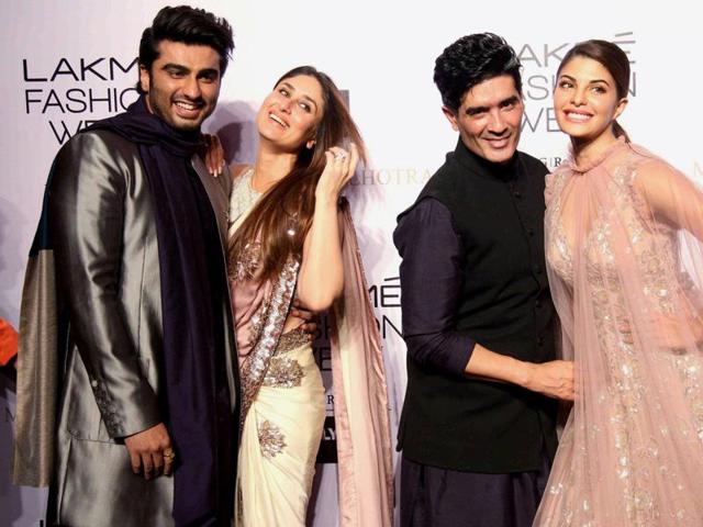 Fashion designer Manish Malhotra with actors Arjun Kapoor, Kareena Kapoor and Jacqueline Fernandez during the opening show of Lakme Fashion Week in Mumbai. (PTI) Fashion designer Manish Malhotra with actors Arjun Kapoor, Kareena Kapoor and Jacqueline Fernandez during the opening show of Lakme Fashion Week in Mumbai. (PTI)