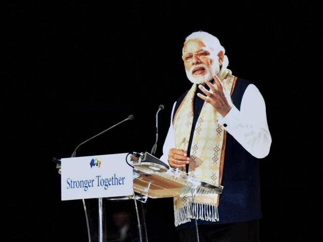 Prime Minister Narendra Modi addresses the public at a community reception in Brussels, Belgium, on Wednesday. (PTI photo) Prime Minister Narendra Modi addresses the public at a community reception in Brussels, Belgium, on Wednesday. (PTI photo)
