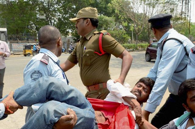 Security men taking away the students agitating for justice to Rohith Vemula at Hyderabad Central University on Saturday. PTI (PTI) Security men taking away the students agitating for justice to Rohith Vemula at Hyderabad Central University on Saturday. PTI (PTI)