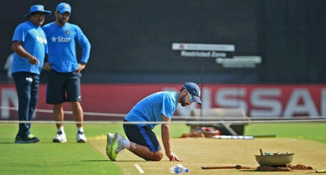 Ajinkya Rahane inspects the pitch during a practice session at the Wankhede. (PTI) Ajinkya Rahane inspects the pitch during a practice session at the Wankhede. (PTI)