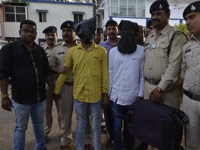 UCO bank loot accused in police custody in Bhopal on Thursday. (Mujeeb Faruqui/ HT photo) UCO bank loot accused in police custody in Bhopal on Thursday. (Mujeeb Faruqui/ HT photo)
