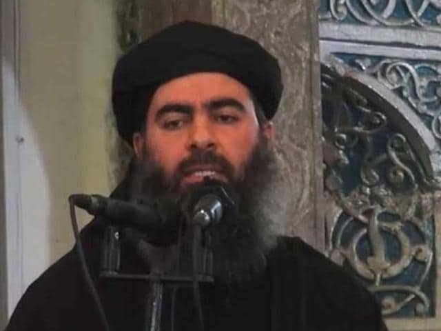 An image grab taken from a propaganda video released on July 5, 2014 by al-Furqan Media allegedly shows the leader of the Islamic State (IS) jihadist group, Abu Bakr al-Baghdadi, aka Caliph Ibrahim, addressing Muslim worshippers at a mosque in the militant-held northern Iraqi city of Mosul.(AFP)