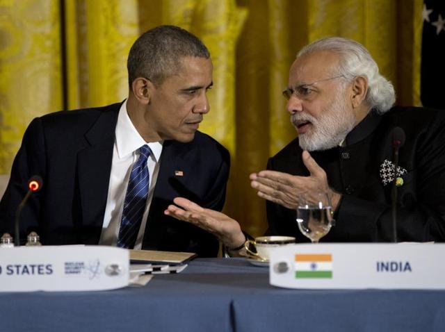 Prime Minister Narendra Modi interacts with US President Barack Obama during a dinner with heads of delegations of the Nuclear Security Summit at the White House. (AP) Prime Minister Narendra Modi interacts with US President Barack Obama during a dinner with heads of delegations of the Nuclear Security Summit at the White House. (AP)