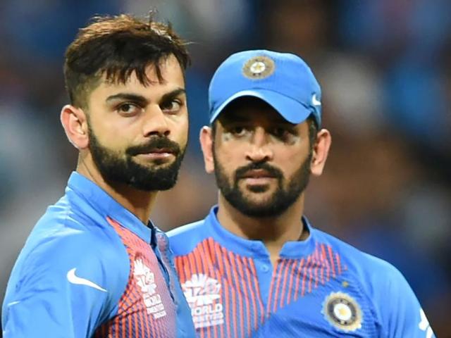 India's Virat Kohli and captain Mahendra Singh Dhoni look on after defeat in the World T20 cricket tournament.(AFP Photo)