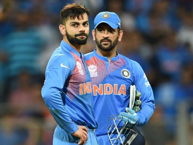 India's Virat Kohli(L) and captain Mahendra Singh Dhoni look on after defeat in the World T20 cricket tournament second semi-final match between India and West Indies at The Wankhede Stadium in Mumbai on March 31, 2016.(AFP)