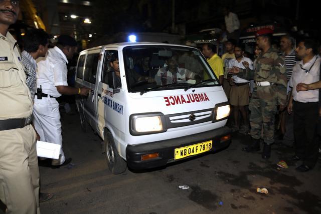 An ambulance with dead body recovered from a partially collapsed overpass makes its way towards hospital in Kolkata, India, Thursday, March 31, 2016. (AP) An ambulance with dead body recovered from a partially collapsed overpass makes its way towards hospital in Kolkata, India, Thursday, March 31, 2016. (AP)