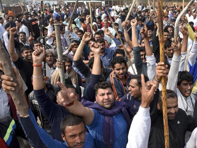 The protesting Jat community members demand reservation in government services in Bahadurgarh in Haryana on February 20, 2016. (HT file photo) The protesting Jat community members demand reservation in government services in Bahadurgarh in Haryana on February 20, 2016. (HT file photo)