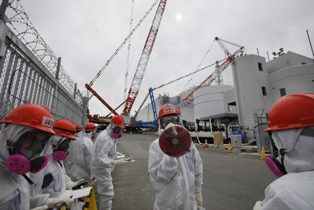 TEPCO, the operator of Japan's destroyed Fukushima nuclear plant, switched on a giant refrigeration system on Thursday, March 31, to create an unprecedented underground ice wall around its damaged reactors. Radioactive water has been flowing from the reactors, and other methods have failed to fully control it. (AP Photo) TEPCO, the operator of Japan's destroyed Fukushima nuclear plant, switched on a giant refrigeration system on Thursday, March 31, to create an unprecedented underground ice wall around its damaged reactors. Radioactive water has been flowing from the reactors, and other methods have failed to fully control it. (AP Photo)
