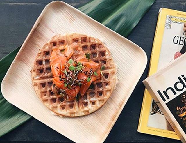 The dosa waffle at Inday at Broadway, New York, is served with Indian chutneys. The dosa waffle at Inday at Broadway, New York, is served with Indian chutneys.